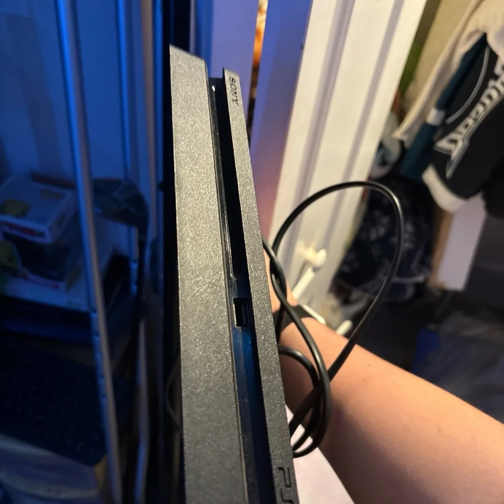 Sony PlayStation 4 Console in Black with Multicolor Logo
